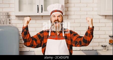 Master chef, cook or baker very happy of good taste with hand Stock Photo