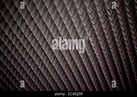 Abstract black geometric texture or background. Diamond-shaped soundproofing in modern music or media studio Stock Photo