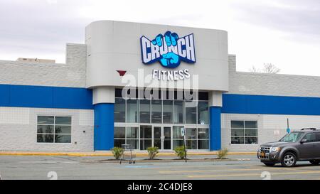 MIDDLETOWN, NY, UNITED STATES - May 04, 2020: Middletown, NY / USA - 05/04/2020: Crunch Fitness Gym Exterior Building and Sign Logo Entrance Stock Photo