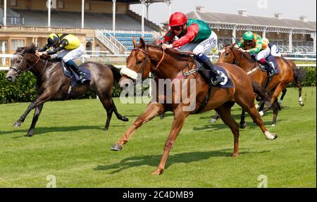 Jawwaal ridden by Callum Rodriguez wins The Sky Ports Racing Sky 415 Handicap Stakes (Div II) at Doncaster Racecourse. Stock Photo