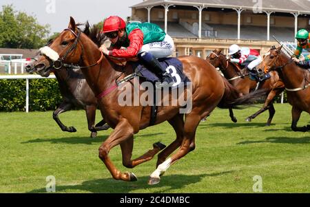 Jawwaal ridden by Callum Rodriguez wins The Sky Ports Racing Sky 415 Handicap Stakes (Div II) at Doncaster Racecourse. Stock Photo