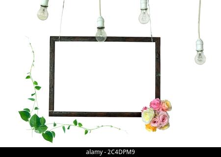 The frame is made from photo frames decorated with bulbs and flowers Stock Photo