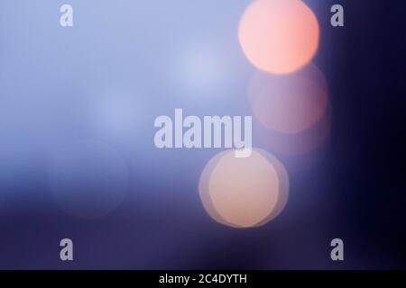 Colorful blue foggy surface, abstract copy space bokeh background, pink and white round blurred spots of light. Stock Photo