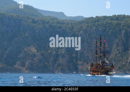 The Dragon, a Pirate Themed Ship Sailing as it Takes Tourists on an Excursion from Oludeniz, Fethiye, Turkey Stock Photo