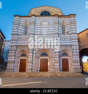 Pavement cafe in Piazza San Giovanni outside the cathedral bapistry. Siena. Stock Photo