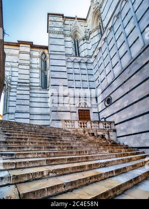 Marble steps for Piazza San Giovanni which lead to the Piazza del Duomo. Siena, Italy. Stock Photo