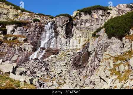 Mountain waterfall Skok, a tourist attraction near to Strbske Pleso in High Tatras National Park, Slovakia Stock Photo
