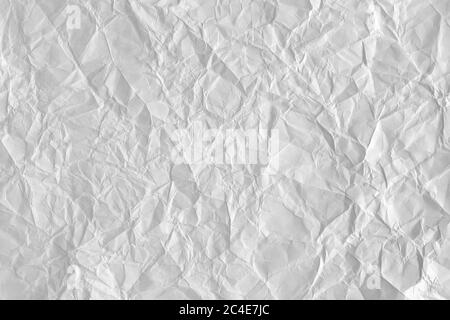 highly crumpled gray paper sheet with dents Stock Photo - Alamy