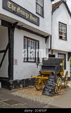 Entrance to the George Hotel, a 15th century coaching inn, in the town of Dorchester On Thames, Oxfordshire, UK Stock Photo