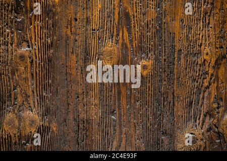 Antique wooden door, wood texture. Weathered aged board. Grunge concept. Macro, close up shot Stock Photo