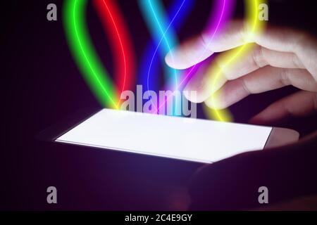 Man using smartphone and protection with fiber optic light on mobile screen. Stock Photo
