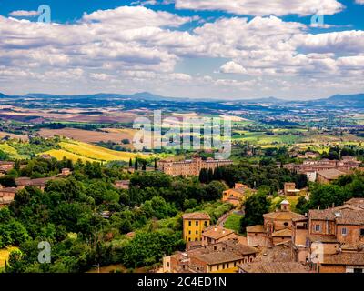 Aerial view of Siena with Villa il Pavone  and the Tuscan countryside in the distance.  Italy. Stock Photo