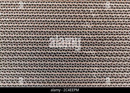 Home moving using corrugated cardboard boxes as protection material, detail. Stock Photo