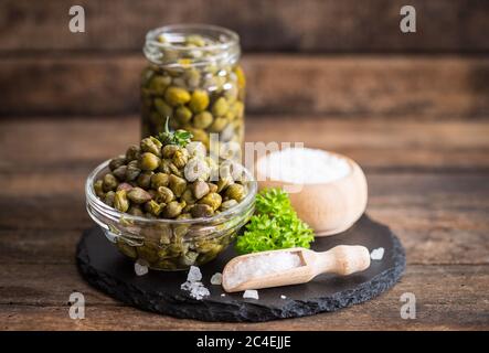 Fresh caper in the glass bowl Stock Photo