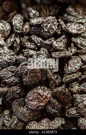 A full frame photograph of prunes for sale on a market stall Stock Photo