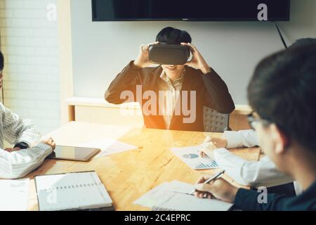 Business meeting with manager using virtual reality headset. Stock Photo