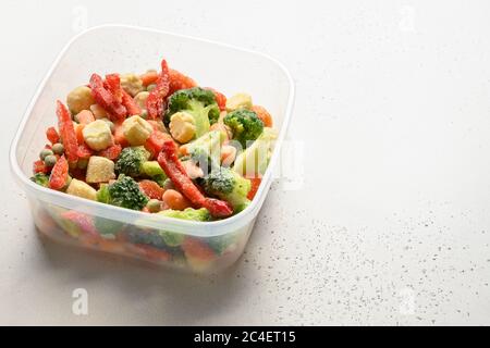Frozen food vegetables on white background Close up. Copy space. Stock Photo