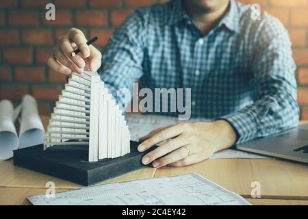 Male engineer using catch modern model in his office. Stock Photo