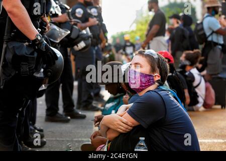 Metropolitan Police of DC face off against sitting peaceful protesters, Black Lives Matter Plaza, Washington, DC, United State Stock Photo