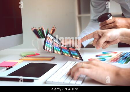 Fashion designers are choosing color chart and color for their new collection. Stock Photo