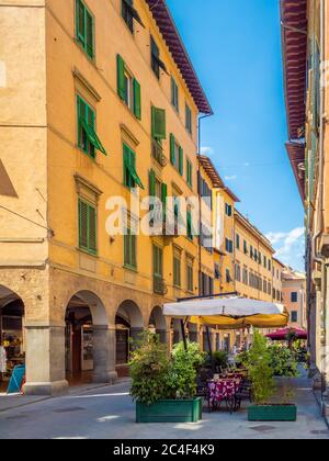 Exterior tables of a restaurant in one of Pisa's footstreets. Pisa. Italy. Stock Photo