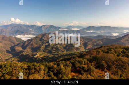 A scenic view of the green hills surrounding the Himalayan town of Tansen in Nepal. Stock Photo