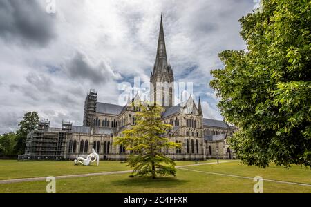 Salisbury Cathedral with Henry Moore sculpture in front in Salisbury, Wiltshire, UK on 19 June 2020 Stock Photo