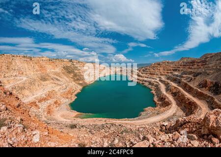 Green lagoon in sand quarry looking like a desert in Tg Pinang ...