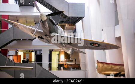 Spitfire fighter and lifeboat on display at the Imperial War Museum, London, England, UK Stock Photo