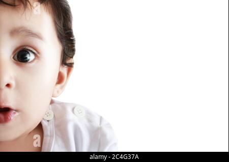 Surprised adorable  child close-up portrait isolated on white background Stock Photo