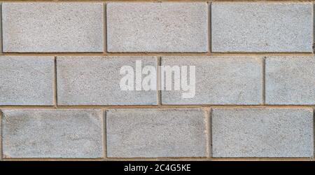 Big grey concrete brick wall texture background, material of industry construction. Stock Photo