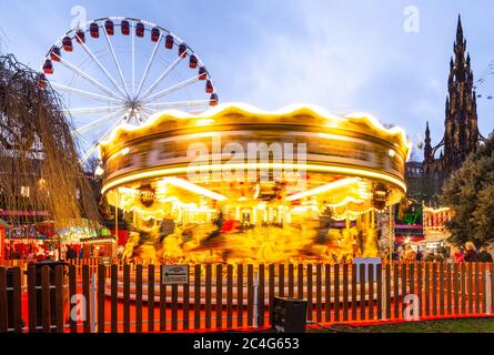 Rotating carousel (roundabout) in Princes Street, Gardens on New Years Day, Edinburgh, Scotland, United Kingdom. Stock Photo