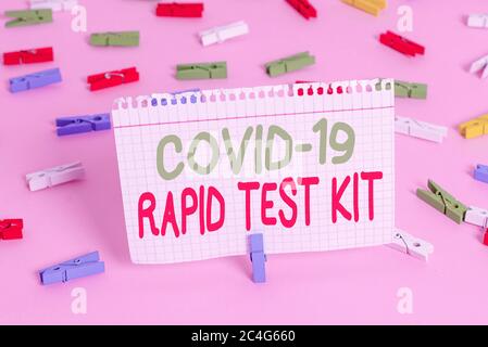 Handwriting text Rapid Test Kit. Conceptual photo Emergency medical diagnostic equipment that deliver fast results Colored clothespin papers empty rem Stock Photo