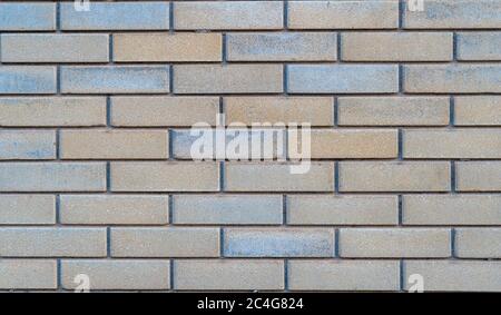 Beige-brown grunge brick wall texture or old surface pattern for background and backdrop, cream tone design element and building material in urban Stock Photo