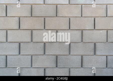 White grey brick wall concrete texture. Grunge, cement. Seamless texture of a brick wall Stock Photo