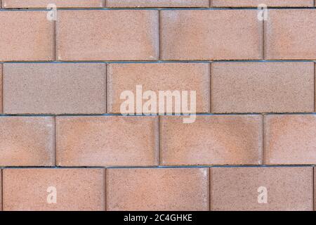Big brown concrete brick wall texture background, material of industry construction. Stock Photo