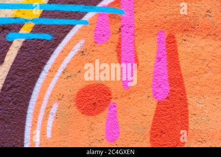 Colorful lines and shapes spray painted on a wall Stock Photo