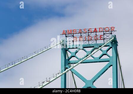 Sign atop the Ambassador Bridge, US-Canada border crossing between Detroit and Windsor. Stock Photo