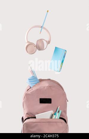 Office supplies stationery levitate over white table Stock Photo