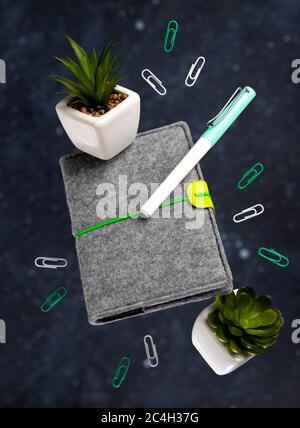 Office supplies stationery levitate over black background Stock Photo