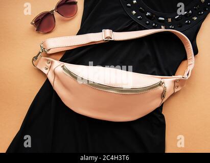 Fashionable stylish belt leather bag in pink color Stock Photo