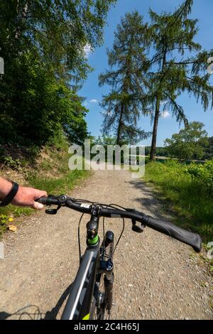 The Hennesee Lake, Hennetalsperre, a reservoir in the Sauerland, cycling around the lake, Hochsauerlandkreis, near Meschede, NRW, Germany Stock Photo