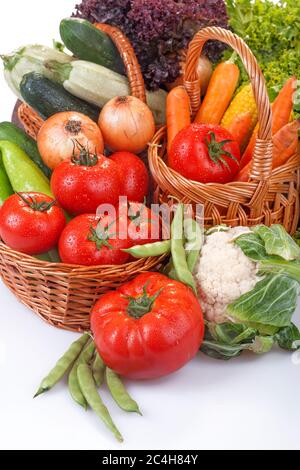 Freshly picked organic vegetables. Baskets with vegetables as the concept of biological, bioproducts, bio ecology, from the home garden healthy food. Stock Photo