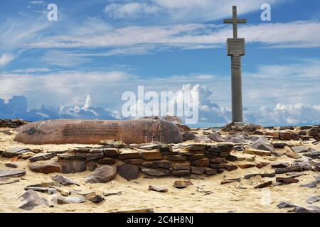 CAPE CROSS, NAMIBIA - JAN 31, 2016: A memorial stone for Diogo Cao who landed at this spot in 1485 and who erected a stone cross or padrao at this spo Stock Photo