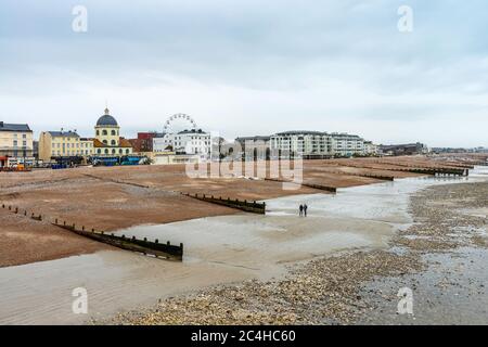 View of Worthing beach, looking east from Worthing Pier.  Worthing, West Sussex, England, UK. Stock Photo