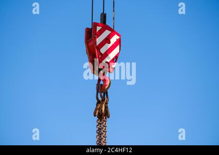 close-up of red and white striped jib on mobile crane Stock Photo