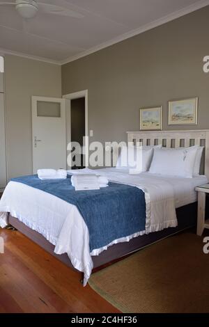 SWAKOPMUND, NAMIBIA - JAN 31, 2016: Accommodation unit interior at Cornerstone Guesthouse. It is a small, private, an easy walk to the sea and the tow Stock Photo