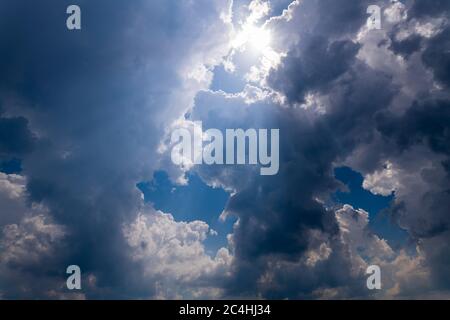 Thunderclouds contract and a storm front develops Stock Photo