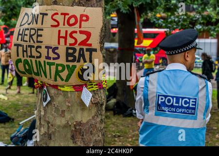 London, UK. 27th June, 2020. The Extinction Rebellion Rebel Trail walkers and protest against HS2 arrives at the end of its journey, which involved walking along the proposed route. The eased 'lockdown' continues for the Coronavirus (Covid 19) outbreak in London. Credit: Guy Bell/Alamy Live News Stock Photo