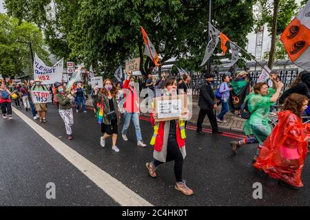 London, UK. 27th June, 2020. The Extinction Rebellion Rebel Trail walkers and protest against HS2 arrives at the end of its journey, which involved walking along the proposed route. The eased 'lockdown' continues for the Coronavirus (Covid 19) outbreak in London. Credit: Guy Bell/Alamy Live News Stock Photo